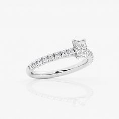 an engagement ring with a princess cut diamond