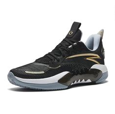 The ANTA Shock Wave 5 Team 'Black Golden' is a stylish and modern sneaker. Its silhouette is inspired by the latest trends, and its black and golden colorway is sure to make a statement. The sole is made of a durable material, providing a comfortable experience for everyday activities and work. The product series is designed to make a bold statement, and the 'Black Golden' edition is sure to stand out. Perfect for those who want to make a statement with their style. Functional Black Basketball Shoes For Streetwear, Dynamic Low-top Basketball Shoes With Shock Absorption, Functional Black High-top Basketball Shoes, Functional Black Basketball Shoes With Boost Midsole, Black High-top Basketball Shoes, Black Shock Resistant Synthetic Sneakers, Basketball Shoes With Shock Absorption And Round Toe, Black Running Sneakers With Shock Absorption, Black Sneakers With Shock Absorption For Running