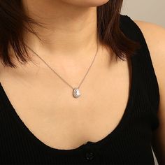 Elevate your style with our stunning pendant necklace, featuring a pear-cut gemstone that will leave you enchanted. The exquisite halo surrounding the gemstone adds a touch of luxury and magnifies its brilliance, creating a captivating focal point. Crafted with precision and attention to detail, this necklace effortlessly combines elegance and sophistication, making it a must-have accessory for any occasion.Carat Weight: 2 ctStone Size: 7*10 mmStone Type: Moissanite/GemstoneNumber of Stones: 1 S Halo Necklace, Diffuser Blends, Pear Cut, Stardust, Personalized Jewelry, Enchanted, Focal Point, Halo, Pear