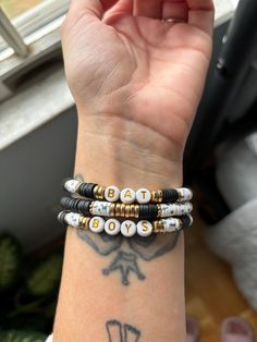 Add a little fun to your jewelry but wearing your favorite book boyfriends name!  These are roughly 6in and very stretchy! These are made to order and may vary slightly from the photos. includes all bracelets pictured.  SHIPPING  please allow 1-7 business days for processing  Let's Connect!  Instagram - Rosyryleighshop  TikTok - RosyRyleigh Novelty Friendship Bracelets With Letter Beads As Gift, Novelty Letter Beads Friendship Bracelet As Gift, Customizable Adjustable Novelty Friendship Bracelets, Trendy Adjustable Friendship Bracelets With Letter Print, Adjustable Friendship Bracelets With Letter Print, Adjustable Friendship Bracelets With Letter Print For Gift, Adjustable Letter Print Friendship Bracelets As Gifts, Adjustable Letter Print Friendship Bracelets Gift, Adjustable Letter Print Friendship Bracelet As Gift