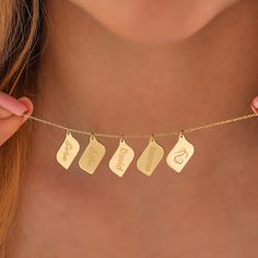 The 14K Solid Gold/Silver Bar Tag Necklace is the perfect choice for providing your loved ones with an unforgettable gift experience. This elegant and unique necklace stands out as a gift that represents cherished memories and emotional bonds. The 14-karat solid gold material highlights the quality of the necklace, while its minimalist design ensures a perfect match for any style. By gifting this necklace on special occasions or moments, you can bring elegance and sophistication to your loved on Mother's Day Gold Plated Dangle Jewelry, Traditional 14k Gold Dangle Jewelry, Symbolic Hypoallergenic Anniversary Jewelry, Symbolic Hypoallergenic Jewelry For Anniversary, Fine Jewelry Nameplate For Gift, Fine Jewelry Nameplate Gift, Symbolic Jewelry Charms For Anniversary, Symbolic Charms Jewelry For Anniversary, Symbolic Yellow Gold Dangle Jewelry