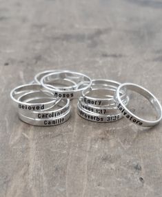 { sterling stacking rings . Personalize rings with names, dates, mantra, inspirational message, etc. } mom rings . personalized name rings . child name stackable rings {ONE} simple sterling ring beautiful for stacking with other rings . custom name(s), date, and or message up to 20 characters . approx. 3mm in width . message only stampable on the outside of the ring {all rings come packaged and ready to gift ~ if shipping directly to gift recipient and you want me to include a note from you just Personalized Silver Engraved Ring, Everyday Stackable Rings With Custom Name, Custom Name Adjustable Stackable Rings, Adjustable Stackable Rings With Custom Name, Adjustable Engraved Stackable Ring For Everyday, Everyday Adjustable Stackable Engraved Ring, Adjustable Personalized Stackable Rings, Custom Name Rings For Everyday, Custom Name Rings For Everyday Wear