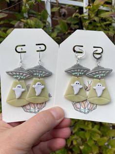 A pair of handmade UFO ghost earrings Made to order! Ghost Earrings, Festival Season, Jewelry Earrings Dangle, Dangle Drop Earrings, Ghost, Dangle Earrings, Accessory Gift, Jewelry Earrings, Electronic Accessories