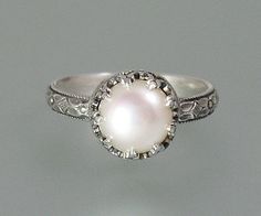 Pearl engagement ring sterling silver pearl by KryziaKreations Vintage White Filigree Wedding Ring, Antique White Filigree Wedding Ring, Heirloom White Gold Moonstone Ring For Wedding, Oval Engraved Moonstone Ring For Wedding, Engraved Oval Moonstone Ring For Wedding, Victorian Silver Pearl Wedding Ring, Victorian Silver Pearl Ring For Wedding, Victorian Style Silver Pearl Wedding Ring, Victorian White Pearl Ring For Wedding