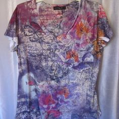 Appropriate Behavior Multi Color V Neck Shirt Sz L Nwnt Short Sleeve Multi Color Size L/12-14 New No Tags Great Condition Never Worn V Neck Shirt Brand Appropriate Behavior 21 1/2 Inches Across Chest 26 Inches In Length Grey/Purple/Off White/Pink/Red Multi Print Nice V Neck Shirt Thank You For Looking Spring Purple V-neck Shirt, Purple Floral Print Short Sleeve Tops, Casual Purple Floral Print Tops, Purple V-neck Summer Shirt, Casual Purple Shirt With Floral Print, Casual Purple Floral Print Shirt, Casual Purple V-neck Shirt, Spring V-neck Purple Shirt, Purple Floral Print Short Sleeve Shirt