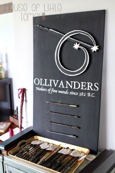 an old drawer is filled with jewelry and other items that are on display in the room