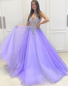 Embellished Tulle V-neck Gown, Lavender Gown For Prom Party, Glamorous Tulle Gown With V-neck, Lavender Gown For Prom Season Party, Purple Tulle Skirt Prom Dress, V-neck Tulle Gown For Prom Season, V-neck Gown For Debutante Ball And Prom, Purple Sweetheart Neckline Evening Dress For Quinceanera, Purple Tulle Dresses With Sequins