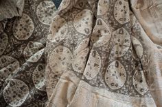 the fabric has been made with an intricate pattern on it, and is very soft