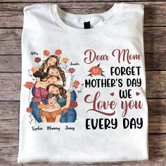 a white t - shirt with the words dear mom and two women hugging each other