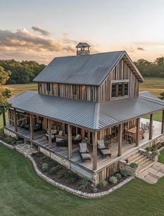 an aerial view of a large house in the country