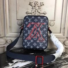 ® Description: Upside-down, these LV Initials are a hallmark of the Men’s 2018 Fall Pre-collection. Designed by Kim Jones the bold pink logo emblazons this Danube PM city bag, crafted of Monogram Ink canvas. Compact, yet roomy enough for essential belongings, it features an adjustable strap for shoulder- or cross-body wear. Size: 8.7 x 6.3 ... Kim Jones, Bag Louis Vuitton, City Bag, Pink Logo, Lv Bag, Online Branding, Coral Pink, Louis Vuitton Neverfull, Cowhide Leather