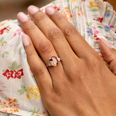 The Story Beautiful in color and style, this vintage ring will stop you in your tracks. Done in platinum, it centers around a gorgeous Imperial Topaz weighing approximately 4.80 carats. The stone sits in a four-prong setting with six single cut diamonds, each weighing approximately 0.03 carats, tapering down the sides. The unique stone has the most beautiful hue. In the orange-pink family, it looks like a sunset. Measuring 0.4 inches tall it looks amazing on the finger. A ring like this is a jewelry staple you'll wear for years to come. The Specs Style Number: R2542 Vintage, circa late 20th century Platinum Imperial Topaz, 4.80 carats, 10.4 x 9.1 mm (approx.) 12 single cut diamonds, each 0.03 carats (approx.) Total diamond weight approximately 0.32 carats Height of front face of ring 0.40" Classic White Gold Topaz Ring, Classic Topaz Ring, Luxury Three Stone Topaz Ring For Wedding, Luxury Three-stone Topaz Wedding Ring, Luxury Three Stone Topaz Wedding Ring, Wedding Topaz Ring With Baguette Cut, Baguette Cut Topaz Ring For Wedding, Classic Topaz Ring With Center Stone, Timeless Topaz Anniversary Ring