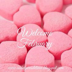 pink heart shaped marshmallows with the words welcome february in white over it