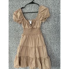 Elevate Your Wardrobe With This Stunning Charlotte Russe Dress In A Beautiful Brown Color. This Dress Is Perfect For Any Occasion, Whether It's A Casual Day Out Or A Party. The Dress Is Made Of A Comfortable Polyester Blend Material With A Knit Fabric Type. The A-Line Style Of This Dress Is Flattering On Any Body Type And The Short Sleeve And Strapless Design Make It Perfect For Summer, Fall, And Spring. The Dress Features A Pullover Closure And A Solid Pattern, Making It A Basic Yet Stylish Add Staple Dress, Tan Dress, Tan Dresses, Colorful Party, Solid Pattern, Summer Fall, Pattern Making, Cocktail Party, Charlotte Russe