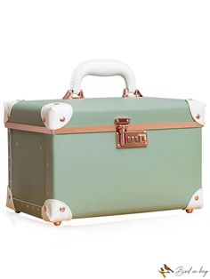 a mint green suitcase with gold trim and handles