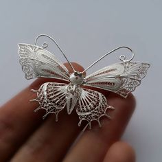 "Butterfly Brooch Mariposa Filigrana - Filigree Brooch - Butterfly Jewelry - Sterling Silver Jewelry - Filigree Jewelry - Handmade Silver Brooch Filigree - delicate jewellery technique made from silver or golden threads \"embroidering\" kind of metalwork lace that is specific to Spain, especially an Andalusian town Cordoba, where they call it a cordobese filigree. This craftsmanship has been passed from generation to generation, nonetheless nowadays there are very few craftsmen left who know to White Ornate Brooches For Formal Occasions, Ornate White Brooches For Formal Occasions, White Ornate Brooch For Formal Occasions, Victorian Wedding Brooches With Intricate Design, Victorian White Brooch For Anniversary, Elegant White Filigree Brooches, Handmade Victorian Brooches As Gifts, Handmade Victorian Brooches For Gift, Victorian White Wedding Brooches