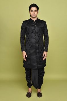 Black sherwani featuring leaf pattern. Paired with a solid sleeveless inner kurta and dhoti pant. - Aza Fashions Traditional Drape Kurta With Tilla For Eid, Transitional Black Sherwani With Cutdana, Black Kurta With Cutdana Traditional Drape, Ceremonial Black Sherwani With Cutdana, Festive Kurta With Tilla And Traditional Drape, Black Churidar With Cutdana For Wedding, Black Cutdana Churidar For Wedding, Black Bandhgala With Cutdana For Festive Occasions, Festive Black Sherwani With Cutdana