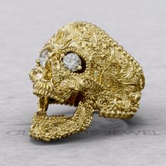 Add a touch of unique elegance to your jewelry collection with this stunning Sugar Skull Floral Aignet Ring. Featuring intricate floral details and a mesmerizing moissanite stone at its center, this ring is sure to catch everyone's eye. Handcrafted with care and attention to detail, this piece of jewelry is perfect for adding a pop of color and style to any outfit. Whether you're a fan of sugar skulls or simply love statement jewelry, this ring is a must-have for your accessory collection. Wear it with confidence and showcase your individual style with this beautiful and one-of-a-kind piece. Model number #RSK000009A-Mois ► Stones: Moissanite If you want other type of stones, please contact me. I should check the availability. You can watch model on my Instagram page: https://www.instagram. Luxury Skull Ring With Polished Finish As Gift, Luxury Skull Ring With Polished Finish For Gift, Luxury Polished Skull Ring As Gift, Luxury Skull Ring As Gift, Luxury Skull Ring For Gift, Elegant Skull Ring For Anniversary, Gothic Skull Ring For Formal Occasions, Luxury White Gold Skull Ring Gift, Gothic Skull Jewelry For Formal Occasions