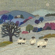 three sheep are standing in the snow near a tree