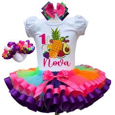 I offer you a beautiful birthday tutu outfit girl. NOTES FOR THE SELLER -Number for personalizing the top. -Name to personalize the vertex. -Need by date. Sleeve for the top - short, long. TOP. The top of it is 100% cotton. Size 3-24 months it is a bodysuit, 2T-10T it is a shirt. (Since it is more handmade always remember the shirt needs to be washed inside out, hand washed and air dried). SKIRT - made of soft tulle, edged at the bottom with a ribbon and decorated with a bow. Tutu is planted on White Fun Tutu Dress For Party, Fitted Multicolor Tutu Dress For Summer, Fun Birthday Sets For Spring, White Tutu Dress For Party, Cute Summer Birthday Party Supplies, Fun Pink Party Sets, Cute Birthday Party Supplies For Summer, Fun Pink Summer Party Supplies, Summer Fun Pink Party Supplies