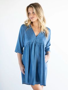 Chambray Stella V-Neck Dress - Denim-view 1 Fall Denim Blue V-neck Denim Dress, Spring Blue Denim V-neck Dress, Casual Flowy V-neck Dress For Day Out, Casual V-neck Dress For Fall Day Out, Casual Fall V-neck Dress For Day Out, Casual Denim V-neck Dress, Casual V-neck Dress For Brunch, Indigo V-neck Summer Dress, Summer V-neck Mini Dress With Relaxed Fit