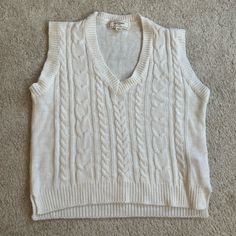 Never Worn/Brand New V Neck, Sleeveless Perfect For Layering Or Styled By Itself! Casual Cable Knit Sleeveless Tank Top, White Cotton Tank Top For Fall, Fitted White Cable Knit Sweater Vest, Cozy Sleeveless Cotton Tops, White V-neck Tank Top For Winter, White Knitted Vest For Fall, White Knit Vest For Winter, Fall White Knitted Vest, Trendy White Knit Vest