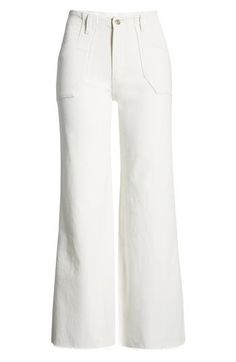 A softly frayed raw-edge hemline lends lived-in appeal to wide-leg jeans that fit slimmer along the thighs and flare out near the hems. 27" inseam; 22 1/2" leg opening; 11 1/2" front rise Zip fly with button closure Front slant pockets 98% cotton, 2% elastane Machine wash, line dry Made in Turkey Chic Flared Cropped Jeans, Chic Flare Cropped Jeans With Five Pockets, Chic Wide-leg Pants With Frayed Hem, Casual Flare Cropped Jeans For Work, Spring Flared Cropped Jeans With Pockets, Chic White Cropped Jeans For Fall, Flared Cropped Jeans For Workwear, Casual Cream Flare Jeans For Spring, Chic Flare Jeans With Frayed Hem For Work