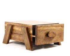 a small wooden table with one drawer open