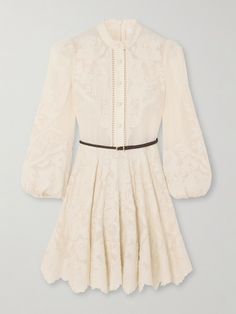 Zimmermann's 'Ottie' dress is detailed with ornate embroidery, which only adds to its whimsical feel. Cut from breathable linen and trimmed with ramie, it's framed with a stand collar and billowing blouson sleeves, falling to a swishy mini skirt with a pretty scalloped hem. Use the braided leather belt to cinch the waist. Elegant A-line Mini Dress With Floral Embroidery, Luxury Fitted Dress With Intricate Embroidery, Chic Formal Dress With Floral Embroidery, Elegant Silk Embroidered Formal Dress, Elegant Silk Dress With Floral Embroidery, Chic Embroidered Dress For Formal Occasions, Luxury Embroidered Silk Dresses, Chic Embroidered Mini Dress For Wedding, Chic Embroidered Formal Dresses