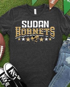 Looking for a stylish and high-quality t-shirt transfer to show off your love for your favorite sports team? Look no further than Rustic Grace's Hornets Aztec Letter DTF Transfer! This full-color, custom heat transfer is easy to apply with a heat press and is designed to last, so you can wear it to games, tailgating events, or just around town with confidence. Our Hornets Aztec Letter DTF Transfer features a bold and eye-catching Aztec letter design making it an ideal t-shirt transfer for anyone T Shirt Transfers, Spirit Shirts, Letter Design, Iron On Vinyl, High Quality T Shirts, Hornet, School Spirit, Lettering Design, Heat Press