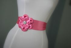 "An accessory to complement your beautiful wedding dress Made of satin fabric with flowers and belt made of satin. In the middle of the flower button is used the crystal. Flower size is approximately 5 \"dimensions. The belt length is approximately 80\"dimensions Flower fitted with lapel pins. Then, a flower can be used as a separate lapel pin. Please feel free to contact for questions and requests. PACKAGE ARE SENT BY FAST SHIPPING COMPANY WITHIN 3 TO 4 BUSINESS DAYS, TO UNITED STATES, TO CANAD Flower Wedding Dress, Beach Wedding Sandals Barefoot, Wedding Anklets, Bridesmaid Sash, Wedding Dress Belt, Wedding Sash Belt, Wedding Dresses With Flowers, Flower Button, Boho Sandals