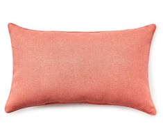 an orange pillow on a white background