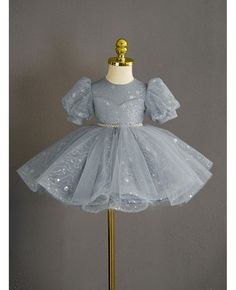 Get 10% off now! Buy dusty blue ruffled tulle girls formal party dress with bling bubble sleeves at cheap price online. Free stable shipping and pro custom service since 2009. Elegant Blue Holiday Princess Dress, Princess Style Puff Sleeve Dress For Party, Formal Princess Style Fitted Tutu Dress, Puff Sleeve Tulle Party Dress, Puff Sleeve Princess Dress With Ruffles For Party, Party Princess Dress With Puff Sleeves And Ruffles, Fitted Puff Sleeve Princess Dress For Parties, Elegant Short Sleeve Princess Dress For Party, Elegant Princess Dress In Glitter Tulle For Party Season