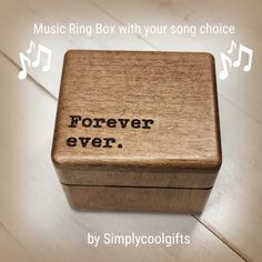 a wooden box with the words forever, ever and music notes on it's lid