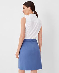 Elevate your wardrobe with the Ann Taylor Seamed Short A-Line Skirt, a testament to timeless elegance and comfort. This skirt is meticulously crafted from a blend of 33% viscose, 32% polyester, 30% recycled polyester, and 5% spandex, ensuring both sustainability and stretch for a perfect fit.

- **Size**: 16 Regular
- **Color**: Precious Sapphire
- **Material**: Viscose, Polyester, Recycled Polyester, Spandex
- **Length**: 21 inches long
- **Closure**: Hidden back zipper with hook-and-eye
- **Li Stretch A-line Skirt For Work, Elegant A-line Skort For Workwear, Elegant A-line Skort For Work, Fitted A-line Elastane Bottoms, Fitted A-line Elastane Skirt, Classic Fitted A-line Bottoms, Elegant Skirted Skort For Workwear, Elegant Skirted Skort For Work, Elegant Fitted A-line Skort