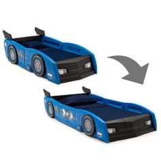 two children's beds with cars on them, one is blue and the other is black