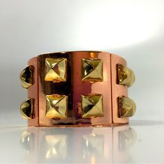 Add Some Edgy Style To Your Accessory Collection With This Copper And Gold Tone Stretch Spike Bangle Bracelet. Made Of High-Quality Metal And Featuring A Unique Cuff Style, This Bracelet Is Perfect For Adding A Touch Of Glam To Any Outfit. The Bracelet Features A Multicolor Spike Design That Is Sure To Turn Heads, Making It A Great Gift For A Fashion-Forward Friend Or A Special Treat For Yourself. This Unbranded Bracelet Is A Great Addition To Any Jewelry Collection And Is Sure To Complement Any Trendy Metal Wristband For Party, Bold Adjustable Party Bracelet, Adjustable Bold Party Bracelet, Bold Adjustable Bracelets For Party, Adjustable Bold Bracelet For Parties, Bold Gold Bracelets For Gift, Bold Gold Bracelets For Gifts, Bold Adjustable Gold Jewelry, Bold Metal Bracelets For Gift