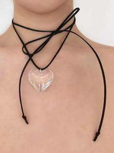 The necklace guaranteed to make your heart skip a beat - prepare to fall in love! Meet the limited edition 'FIRST DATE' suede wrap choker - featuring a large clear heart pendant strung alongside faux black suede leather, this piece will easily make a statement with any look! ♥ Made with a large clear glass heart pendan Trendy Party Choker With Heart Charm, Trendy Party Choker With Heart Pendant, Trendy Heart Charm Choker For Party, Adjustable Heart Charm Choker For Party, Adjustable Heart Pendant Choker For Parties, Party Choker With Heart Pendant, Trendy Adjustable Choker For Valentine's Day, Black Heart Pendant Choker, Trendy Adjustable Choker With Heart Charm