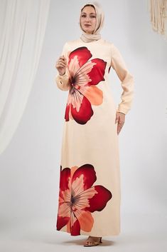 Elevate your wardrobe with the Blossom Elegance Maxi Dress, a perfect blend of sophistication and style. This stunning dress, crafted from durable crepe polyester, features a vibrant and bold floral design that exudes confidence and grace. The elegant long sleeves and high neck provide a modest yet fashionable look, perfect for any occasion. The dress is lined for added comfort and coverage, ensuring you feel as good as you look. The intricate floral pattern is strategically placed to enhance th Modest Activewear, Full Coverage Swimsuit, Abaya Dress, Active Wear Tops, Stunning Dresses, Trousers Women, Floral Pattern, The Dress, High Neck