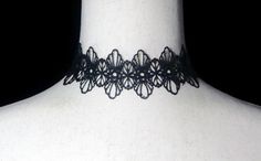 This item is a classic black lace and silver tone metal choker necklace. This vintage necklace is 15 to17 Inches, adjustable, with a lobster claw clasp. For daily, business or evening wear.  DETAILS:  ☼ Approximately 1 3/4 inches wide,  15 to 17 inches long. ☼ Approximately 5.8 grams, total weight. ☼ ☼ ☼ ☼ ☼ ☼ ☼ ☼ ☼ ☼ ☼ ☼ ☼ ☼ ☼ ☼ ☼ ☼ ☼ ☼ ☼ PLEASE NOTE:  ☼ Different items on SALE everyday!  Check back often to take advantage of these bargains! ☼ FREE DOMESTIC SHIPPING on purchases of $35 or more. Combined shipping is still available to domestic and international locations. ☼ This shop is happy to accept exchanges, returns for store credit.  Cash returns are only available in the rare event that an item is inaccurately described.  For example, if an item is described as gold but is actually Black Thread Necklace, Metal Choker Necklace, Metal Choker, Thread Necklace, Black Choker, Black Thread, Necklace Vintage, Favorite Pins, Black And Silver