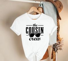 Cousin Crew Matching Family Shirts,Summer Cousin Tshirts,Family Matching Tees,Cousin Crew Gifts,Cousin Crew Tshirts,Cousins Beach Vacation 🎁 Enjoy your shopping ! Need custom made shirts? Don't hesitate to message us! Thanks for your support! CustomShirtsZone_ Family ✨There are all sizes in the dropdown menu. These designs are for both kids and adults. Please make sure you purchased the correct size. ----- How To Order ----- 1-) Please, check and review all the photos. 2-) Choose your t-shirt size and color. *Different styles of shirts may have different shades of same color choice due to different manufacturer brands. *For this reason, we recommend you to match shirts from the same styles if you want precisely matching colors (ex. Unisex, V-necks, Toddler, etc.). 3-) Click add to cart. Y Cousin Tshirts, Cousin Shirts, Cousins Beach, Matching Family Shirts, Cousin Crew, Custom Made Shirts, Family Shirts Matching, Shirts Summer, Christmas Snacks