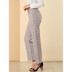 These pants are essential for dressing up or down. Lightweight fabric, covered in a plaid pattern, shapes these trendy trousers with a high-rise fit. How it is a bit high waist and how it gathers at the waist adding shape to the body. You may love everything about these trousers, from their regular fit to the elastic high-waist, which could double as a hiding mechanism for women with love handles. Style these trousers with a crop top and heels for the ultimate look. This fashionable and trendy c Chic Plaid Straight Leg Pants, Chic Plaid Bottoms For Business Casual, Elegant High-waisted Plaid Pants, Chic Plaid Straight Leg Bottoms, Elegant Plaid Pants For Office, Chic High-waisted Plaid Pants, Plaid Straight Pants For Office, Plaid High-waisted Pants For Business Casual, Plaid Trousers For Office