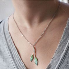 "This spring green necklace is very tender and feminine. Matched earrings are here: http://www.etsy.com/listing/126824630 - Size: around 5 cm / 2\" lobster clasp - Please give an allowance for slight difference in size, shape and tint since each piece is individually handmade. - Each purchase comes carefully packaged. -Please note that real colors may slightly differ from their appearance on your display." Green Leaf-shaped Jewelry Gift, Handmade Light Green Jewelry Gift, Elegant Light Green Necklace For Gift, Handmade Green Leaf Necklace, Nature-inspired Green Jewelry For Jewelry Making, Green Pendant Jewelry With Lobster Clasp, Handmade Green Leaf-shaped Jewelry, Nickel-free Green Leaf-shaped Jewelry, Green Leaf-shaped Necklace For Gift