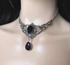 "Choker: This elegantly ornate necklace is made with antique silver tone centerpieces, featuring lavish baroque details. Its mesmerizing design is accented with dazzling deep violet purple glass crystals/jewels. Decorated portion is 4\" wide and 2 1/2\" tall in the very center. Necklace length is adjustable 14\"-17\" with soldered stainless steel cable chain, lobster clasp and extender. If you would like a different length, please send us a message. Earrings: These dainty and elegantly ornate ea Black And Purple Jewelry, Dark Green And Dark Purple Wedding, Purple Black And Silver Wedding, Baroque Details, Deep Purple Wedding, Labyrinth Ball, Dark Purple Wedding, Gothic Antique, Ornate Necklace