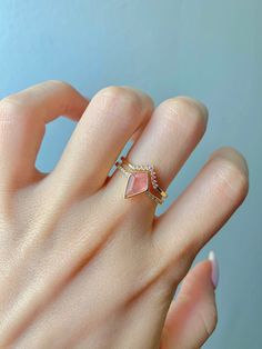 This gorgeous, timeless ring features our favorite Strawberry Quartz design and hand picked crystals.  This is a 2 piece set.  Libra is the zodiac sign of strawberry quartz. For those who are born from September 23 to October 22, things you would want to let go, such as possessiveness and indecisiveness, will disappear with the gem. The romantic within you will wake up and find opportunities to seek love when the stone is by your side. the crystal awakens new talents such as music and painting or writing. ✦ DETAILS ✦ ✧ Handcrafted  ✧ 1.25 Carat center stone ✧ Strawberry Quartz and crystals  ✧ Sizes 3.75-11.25 ✧ This ring will arrive ready to gift in a Kherish Jewelry Pouch. ✧ PRE-ORDER: Items that are preorder only will ship within 10-15 business days.  You will receive an email with the u 14k Gold Jewelry With Vs Clarity For Proposal, Rose Gold Diamond Stackable Birthstone Ring, Stackable Rose Gold Diamond Birthstone Ring, Pink Gold Ring With Diamond Accents, Stackable Rose Gold Crystal Diamond Ring, Rose Gold Stackable Rings With Birthstones And Diamonds, Rose Gold Diamond Stackable Rings With Birthstone, Pink Gemstone Stackable Promise Rings, Rose Gold Stackable Gemstone Rings