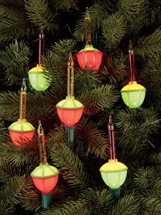 christmas lights hanging from the branches of a tree