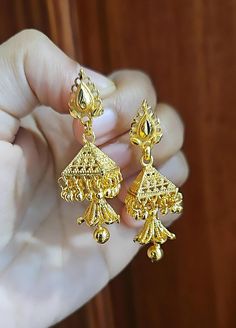 22k Real Dubai Gold Finish Small Dangling Jhumka Earrings.  *Simple - Lightweight- cute 😍, *Size:  Drop Length 4.5 Cm  * Best For everyday wear but maintain our jewelry Care guidelines. ●SAME Day Shipping if you place order between  1 am to 1 pm.  ● Ships Next working day from New York city with USPS standard 3-5 working day delivery service.  ● Free Shipping Over $35 Shopping. ● Everyday Wear Convince Earrings for Gold Lovers. ● Handmade and Finished Simple Lightweight Hoop Drop Earrings. Best Heavy Yellow Gold Jhumkas For Gifts, Jumki Gold, Gold Jhumkas For Rituals, Hand-set 22k Gold Jhumkas For Celebrations, Elegant Gold Jhumkas For Rituals, Luxury 22k Gold Traditional Jhumkas, Small Jhumka Earrings, Jhumkas Gold, Small Jhumka