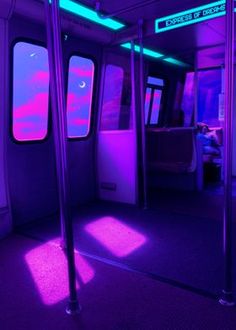 the inside of a subway car with purple and blue lighting