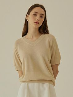 This is a feminine and modern top by MangoManyPlease that is made out of high quality and sturdy material. With distinctive mood of the design and comfortable wear, you can style it for your feminine daily outfit.- Cool touch of linen blend fabric- Ribbed cuffs, necklie, and hem- Trendy and feminine mood Relaxed Fit V-neck Knit Top For Work, Beige Cotton V-neck Knit Top, Chic Cashmere Tops In Solid Color, Chic Solid Cashmere Tops, Cream Fine Knit V-neck Top, Casual Beige Cashmere Top, Elegant Relaxed Fit Knit Top For Work, Chic Everyday Cashmere Tops, Spring Cashmere Tops With Relaxed Fit