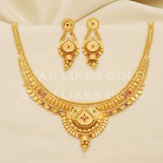 22kt yellow gold handmade chain necklace jewelry from Rajasthan India. Brand- StarLikesGoldIndia Weight- 18.22  grams approx. Metal- yellow gold real gold. Metal purity- 22 Karat. Max Length - Necklace 4.75 inches approx. Earrings - 4 centimeter approx Max Width- Necklace 3.5 centimeter approx. Earrings - 1.7 centimeter approx Condition- excellent brand new Please feel free to ask if you have any query. Elegant Gold Necklace, Handmade Chain, Length Necklace, Set Jewelry, Gold Necklace Set, Jewelry Indian, Gold Necklace Designs, Rajasthan India, Delicate Chain